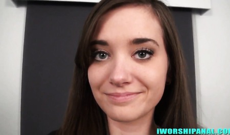 A young woman during the casting sits on anal