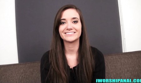 A young woman during the casting sits on anal