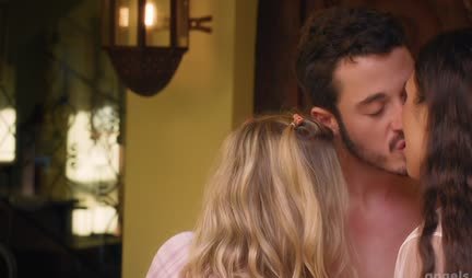 Two young cuties with one guy are having fun