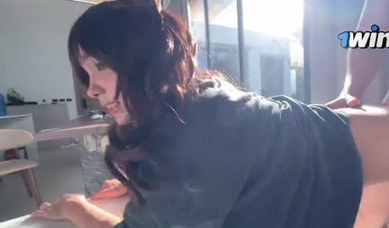 A beautiful Asian girl with a great ass gets fucked doggy style