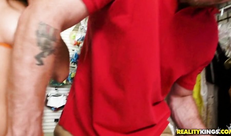 Beautiful brunette meets a guy in the store and has sex