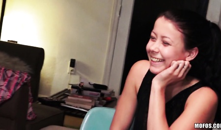 Young couple makes love in the bedroom